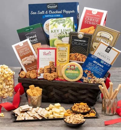 Unmatched in quality or value, this basket is a superb way to express thanks, congratulate, or send your heartfelt condolences. A stunning rustic basket is filled with a wide variety of crowd pleasers such as garlic summer sausage, rich cheddar cheese, zesty lemon wafer rolls, and sweet cinnamon pecan shortbread cookies.

Includes:
* Sea Salt & Cracked Pepper Kettle Corn - 4.2 oz.
* Stoned Wheat Crackers - 4 oz.
* Chichester Crunch Snack Mix - 2 oz.
* Roasted & Salted Peanuts - 2 oz.
* Blueberry Pomegranate Trail Mix Crunch - 1 oz.
* Jalapeo Monterey Jack Cheese - 6 oz.
* Lemon Wafer Rolls - 3 oz.
* Key Lime Cookies - 4 oz.
* Vanilla Wafer Rolls - 4.4 oz.
* Peanut Butter Chocolate Chip Cookies - 4 oz.
* Cinnamon Pecan Straws - 3.5 oz.
* Cheese Straws - 4 oz.
* Garlic Sausage - 5 oz.
* Almondina Biscuits - 4 oz.