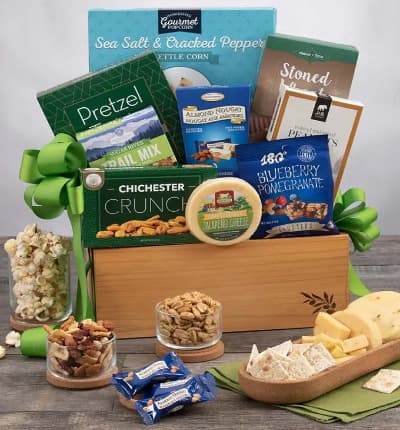 Looking for some wholesome goodies to keep them feeling well? We've got you covered! This delicious treasure trove of trail mix, nuts, cheese, crackers, and popcorn is a scrumptious care package that they're sure to appreciate.

Includes:
* Pretzel Twists - 3 oz.
* Chichester Snack Mix - 2 oz.
* Roasted & Salted Peanuts - 2 oz.
* Earl Grey Tea - 8 sachets
* Garlic Cheese - 2 oz.
* Sea Salt & Cracked Pepper Kettlecorn - 4 oz.
* Stoned Wheat Crackers - 4 oz.
* Blueberry Pomegranate Trail Mix Crunch - 1 oz.
* Cranberry Orange Tea - 8 sachets
* Almond Cashew Clusters with Pumpkin Seeds - 1 oz.