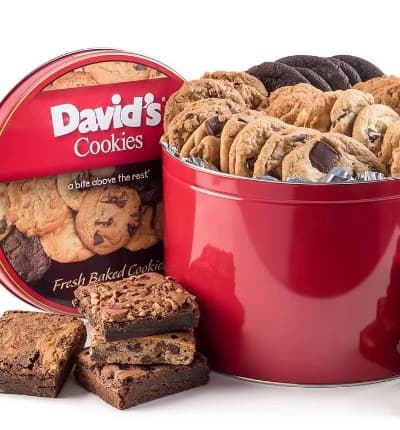 Having a party? Then this is the perfect thing for dessert! Our cookies and brownies are shipped in a David's Cookies tin and come with a complimentary greeting message. Contains approximately 32 (1.5 oz) assorted cookies and 8 (4 oz) individually wrapped assorted brownies.

Includes:
* Chocolate Chunk
* Peanut Butter
* Macadamia with White Chip
* Oatmeal Raisin
* Double Chocolate Chunk Cookies
* Assorted Brownies
* Kosher OU/D certified
* Card Message Included