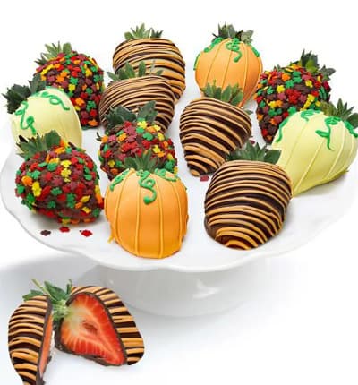 Fall is here, and with it, the sweetest Belgian Chocolate Covered Strawberries you have ever tasted. These one dozen berries are each hand dipped in Belgian Chocolate and then decorated with the colors of the season to make them an especially appropriate fall gift.
Includes:
* Dozen Large Strawberries
* Milk, Dark & White Chocolate
* Fall Themed Sprinkles
* Chocolate Orange Drizzle
* Reusable Cooler Included.
ALLERGEN ALERT: Product contains egg, milk, soy, wheat, peanuts, tree nuts and coconut. We recommend that those with food related allergies take the necessary precautions.
