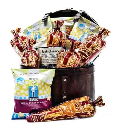 Who wants to be in popcorn Heaven?! This decadent hat box full of gourmet popcorn will keep family and friends munching on deliciousness for days! Make family movie night memorable as the whole clan tastes and enjoy so many flavors of popcorn.

Includes:
* Popcornopolis Cheddar Cheese, Caramel, and More!
* Funky Chunky Mixed Popcorn
* Gary Poppins Popcorn
* Keepsake Hat Box