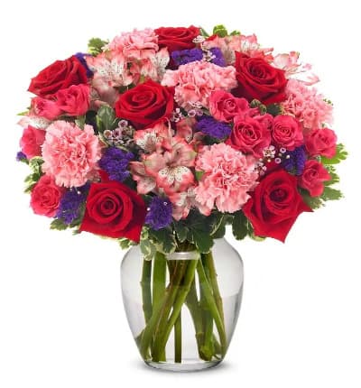 * Red Roses
* Purple Waxflower
* Pink Alstroemeria
* White Alstroemeria