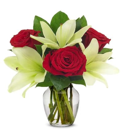 * Red Roses
* White Lilies
* Clear Glass Vase