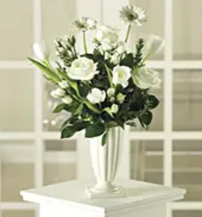 * White Roses
* White Tulips
* White Gerbera Daisies
* White Vase