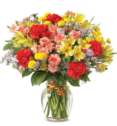 * Colorful Carnation Variety
* Alstroemeria & Button Poms
* Clear Glass Vase