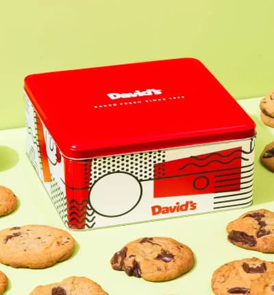 Our classic fresh-baked chocolate chip cookies taste just like homemade cookies because they are baked fresh and shipped daily. The ideal gift for a friend, family member or associate. The cookies are shipped in a David's Cookies tin and come with a complimentary greeting message. Contains approximately 24 (1.5 oz) cookies. Send chocolate chip cookies to someone you love with a sweet tooth!

Includes:
* Approximately 24 Cookies
* David's Cookie Tin
* Kosher OU/D certified
* Card Message