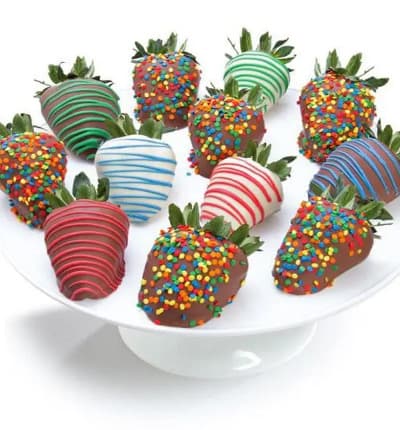 Surprise them on their special day with a delectable gift! Our premium strawberries are hand-dipped in delicious Belgian chocolate by our Artisans. Each strawberry is layered in a variety of dark, white and milk chocolate. This gourmet masterpiece is then decorated with colorful candies and a fancy chocolate drizzle, making this the perfect Birthday gift!
Includes:
* Birthday Theme
* 12 Strawberries
* Milk, White & Dark Chocolate
* Sprinkle Decorations

ALLERGEN ALERT: Product contains egg, milk, soy, wheat, peanuts, tree nuts and coconut. We recommend that those with food related allergies take the necessary precautions.