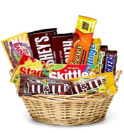 Looking to send the perfect gift to someone special with a sweet tooth? Look no further than Everyone's Favorite Candy Basket! Hand arranged and hand delivered by a local florist, this candy basket is generously packed with some of America's favorite and famous sweet treats. This gift is perfect for all ages and for almost any occasion! Send today. Please note: contents may vary.

Includes:
* Chocolate & Candy Variety
* Keepsake Basket
* Card Message Included