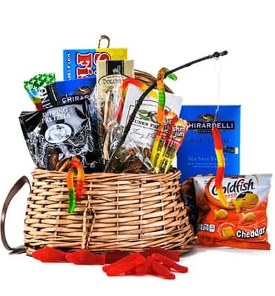 Celebrate someone you love, who loves to go fishing with this Gone Fishing Gift Basket. The gift is delivered in a woven basket with fish themed treats. From goldfish crackers to gummy worms, this fishing gift basket is a wonderful birthday or just because gift.

Includes:
* Swedish Fish
* Ghiradelli Sea Salt Chocolate Bar
* Gummy Worms
* Pepperige Farm Goldfish
* Kind Granola Bar
* Doletto Cookies
* Nunes Farm Salted Pistachios
* Eash Shore Dipped Pretzels
* Slim Jim Beef Snack Sticks
* Woven Basket