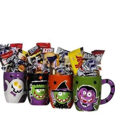 Our keepsake ceramic Halloween character mugs are adorable. Even better, they're filled to the brim with Halloween treats that will be gobbled up quickly! Our mugs are of four different characters each filled with candies and chocolates. Please note we are unable to accommodate specific mug choices; we will gladly pick the perfect one for you! One (1) mug per order.

Includes:
* Candies and Chocolates
* One (1) Halloween Mug per Order