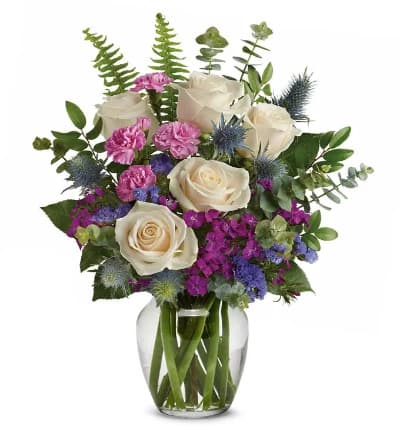 * Creme Roses
* Pink Mini Carnations
* Burgundy Sweet William
* Purple Sinuata Statice
* Blue Eryngium
* Huckleberry
* Spiral Eucalyptus
* Sword Fern
* Clear Glass Vase