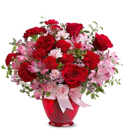 * Red Roses
* Pink Alstroemeria
* Red Carnations
* Pink Waxflower
* Red Vase with Ribbon